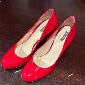 Vibrant Red High Heels with Elegant Design and Medium Height